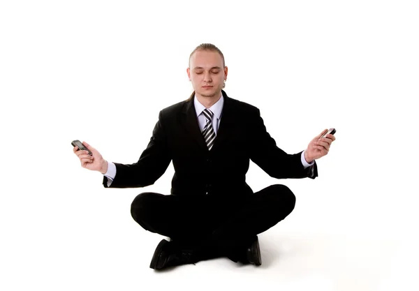 Business yoga with mobile phones — Stock Photo, Image