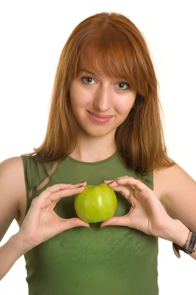 Menina sensual segurando maçã como um coração — Fotografia de Stock