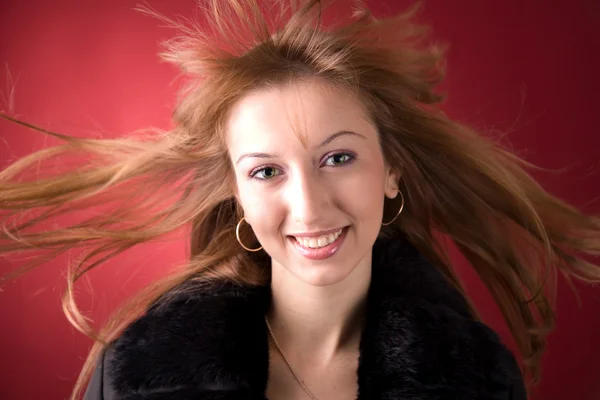 Beautiful girl with flying hair — Stock Photo, Image