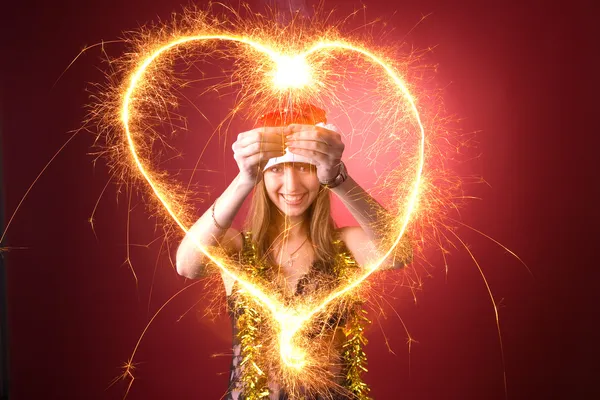 stock image Smiling girl drawing heart