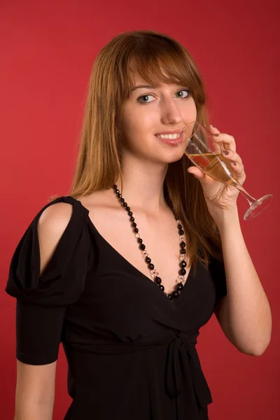 Aantrekkelijk meisje met champagne glas — Stockfoto