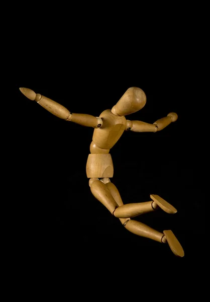 Flying wooden puppet — Stock Photo, Image