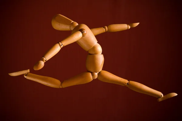 Fantoche de madeira voadora — Fotografia de Stock