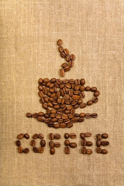 Coffee cup over canvas background