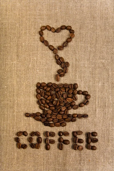 Kaffeetasse über Leinwand Hintergrund — Stockfoto