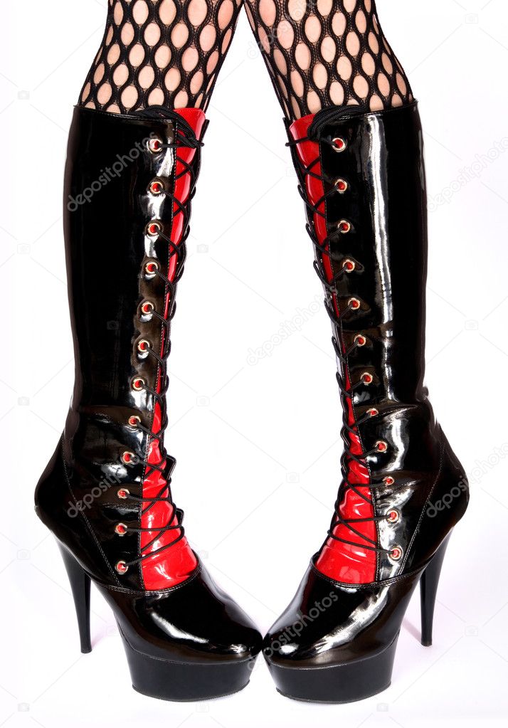 Female legs in fetish boots