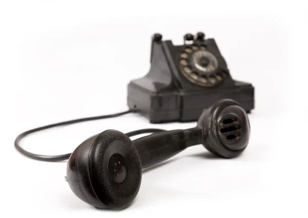 Oude zwarte telefoon met krassen — Stockfoto