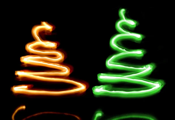 Duas árvores de Natal brilhantes — Fotografia de Stock