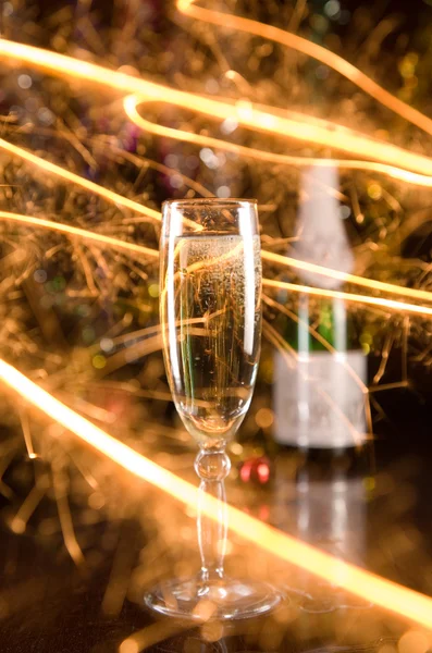 Új év kártya üveg pezsgőt és a s — Stock Fotó