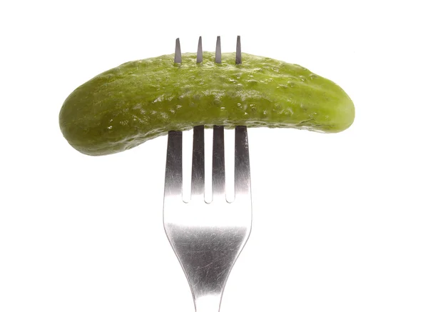 Salted cucumber on fork — Stock Photo, Image