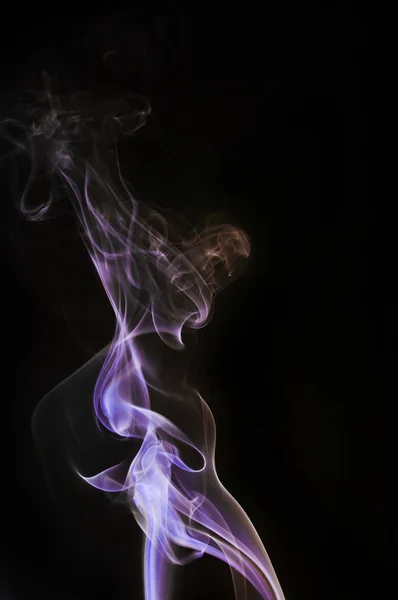 Renkli mavi-sarı sigara dumanı — Stok fotoğraf