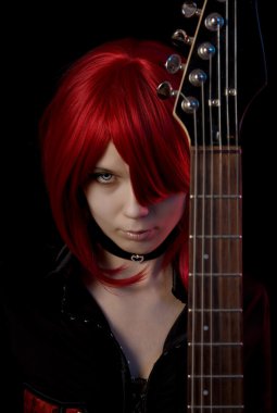 Sexy vampire girl with guitar clipart