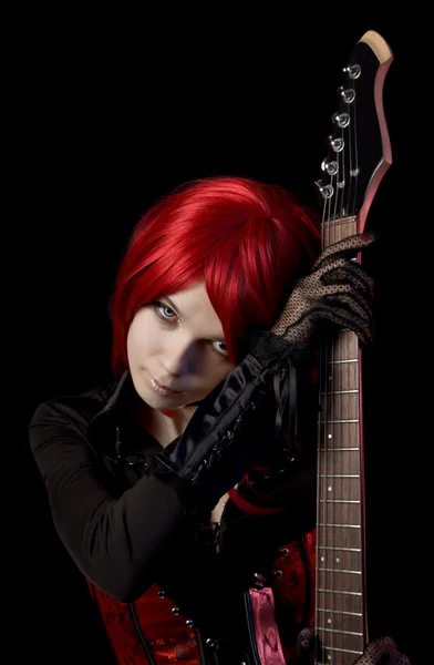 Sexiga röda hår flicka med gitarr — Stockfoto