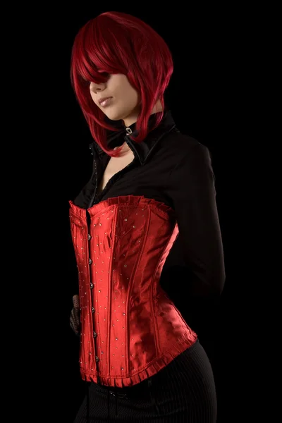 Smyslná dívka v červené glamour korzet — Stock fotografie