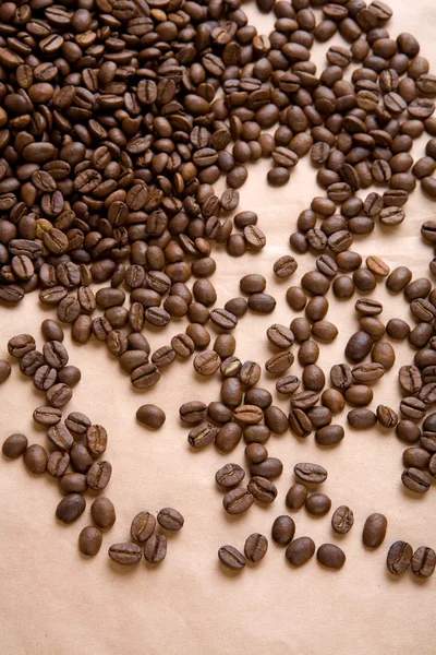 Bakgrund av kaffe på ett papper på nära håll — Stockfoto