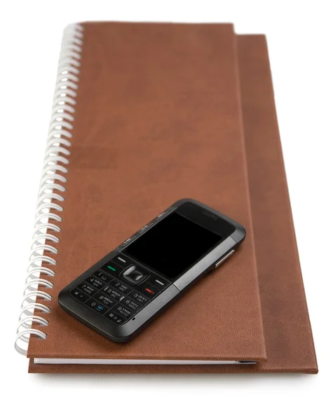 Telefone e notebook — Fotografia de Stock