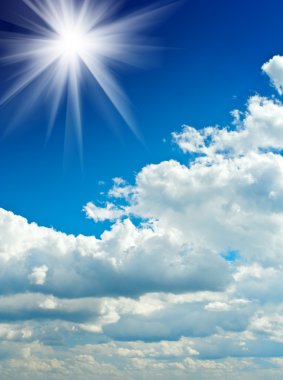 Cloudy blue sky with sun clipart