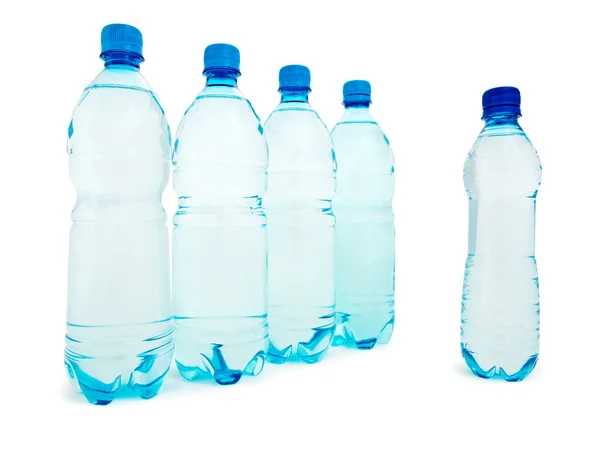 Grupa niebieska butelka na białym tle — Zdjęcie stockowe