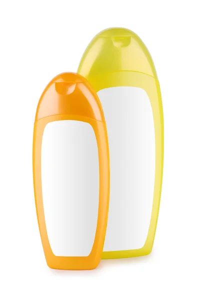 Butelka pomarańczowy i żółty na białym tle — Zdjęcie stockowe