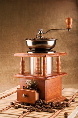 Coffee mill with coffee beans clipart