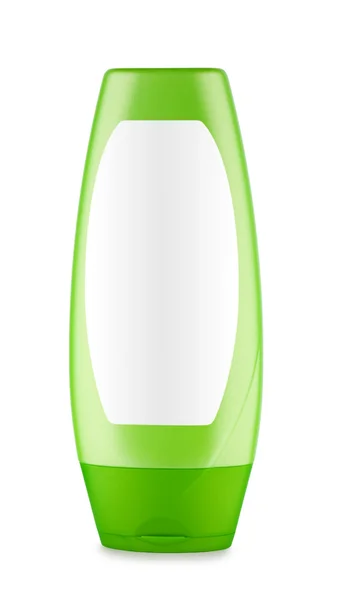 Зелена пляшка шампуню — стокове фото