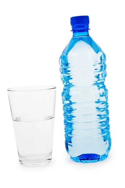 Blå flaska och genomskinligt glas — Stockfoto