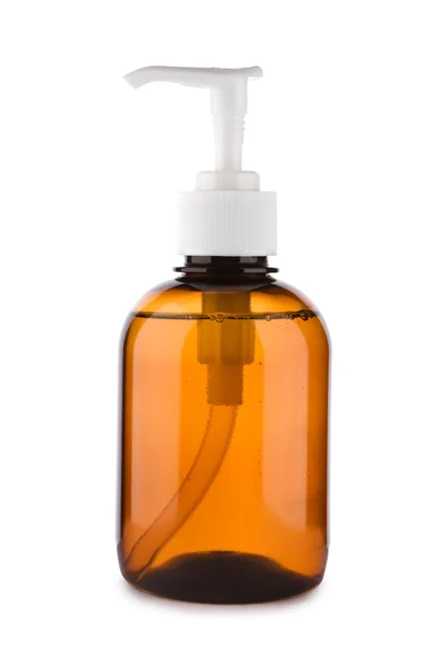 Průhledný oranžový sprej parfémy láhev — Stock fotografie