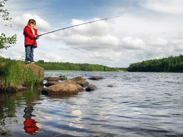 Little angler on the lake — Stock Photo, Image