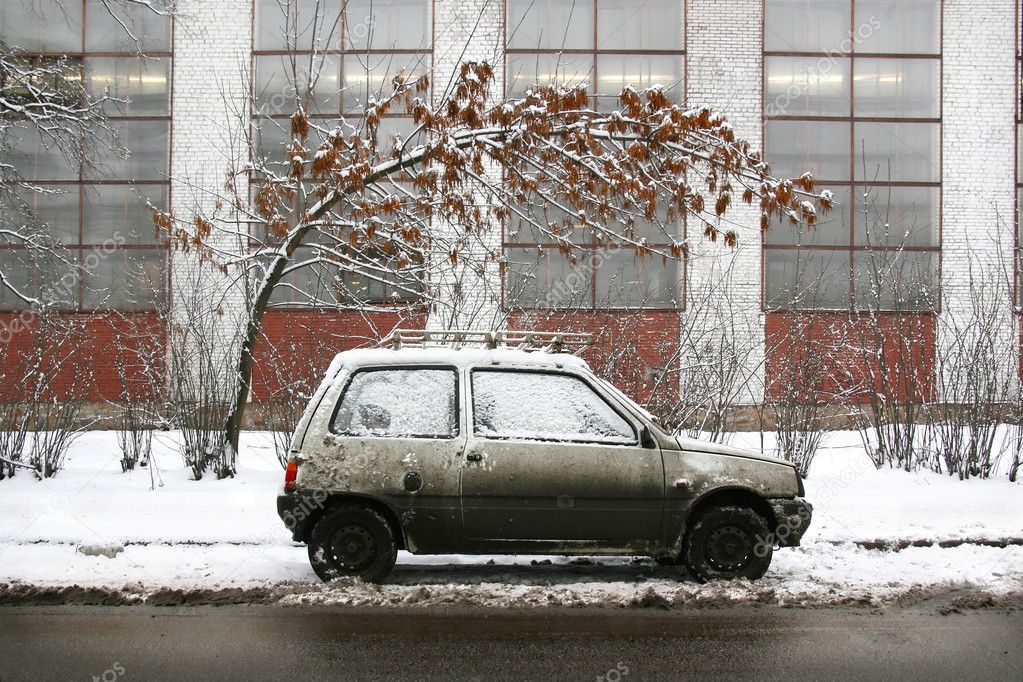 Car in dirty winter