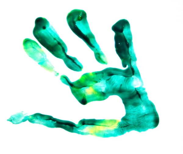 Het afdrukken van een hand met een groene verf — Stockfoto