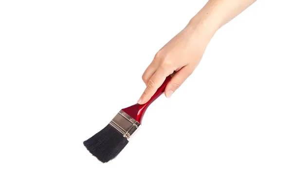 Womens Hand Holding a paint brush — Stock Photo, Image