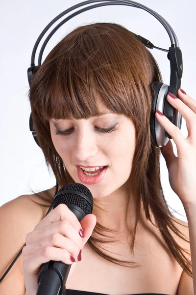Woman Singing in Microphone — Stock Photo, Image
