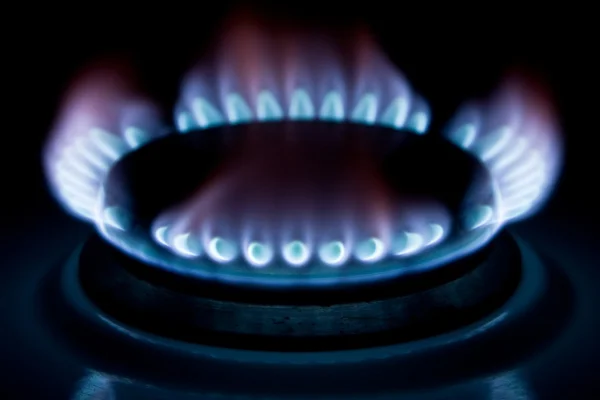Flame of gas over black background — Stock Photo, Image