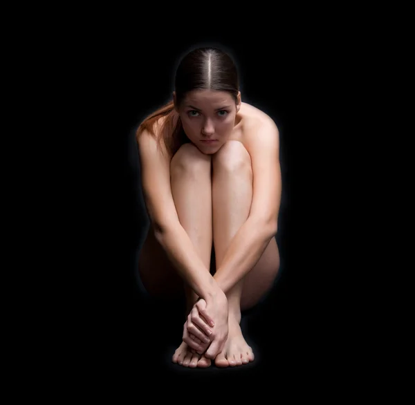 The girl on a black background — Stock Photo, Image