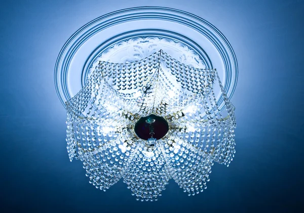 Crystal chandelier on a ceiling — Stock Photo, Image