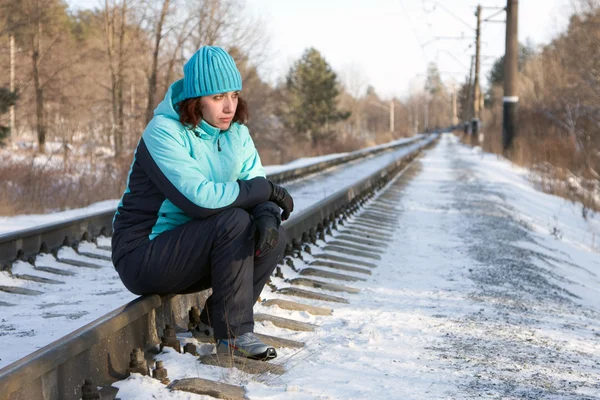 The woman sitting on rails — Stock Photo, Image