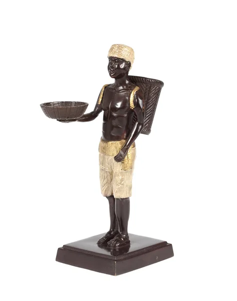 Statyett av pojken med en bricka — Stockfoto