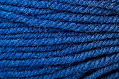 Close-up With a dark blue woollen thread clipart