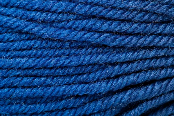 Close-up With a dark blue woollen thread — Stock Photo, Image