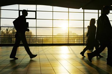 business people walking in office  clipart