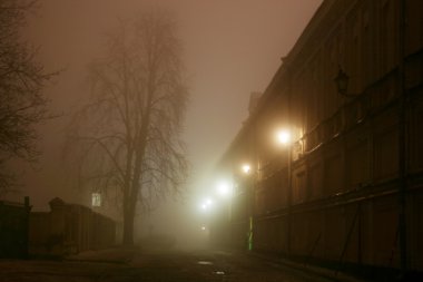 Night street in the fog clipart