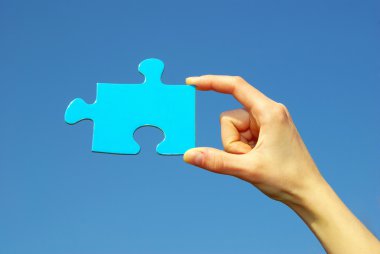 Puzzle in hand clipart