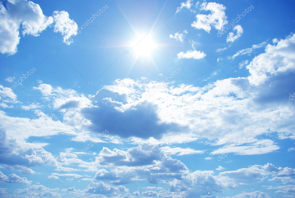 Sun in a blue cloudy sky