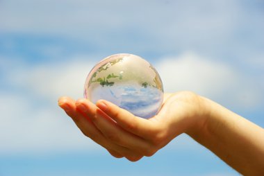 Globe in hand clipart