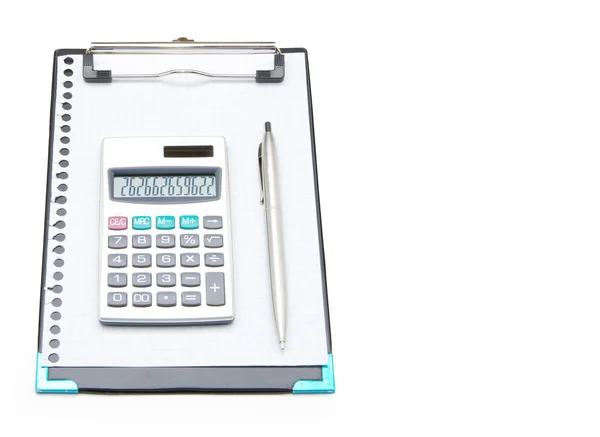Calculator on notebook — Stok fotoğraf