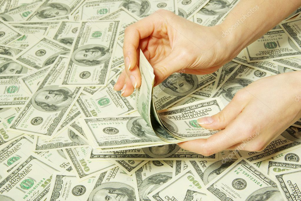 Hand with money Stock Photo by ©Pakhnyushchyy 2337629