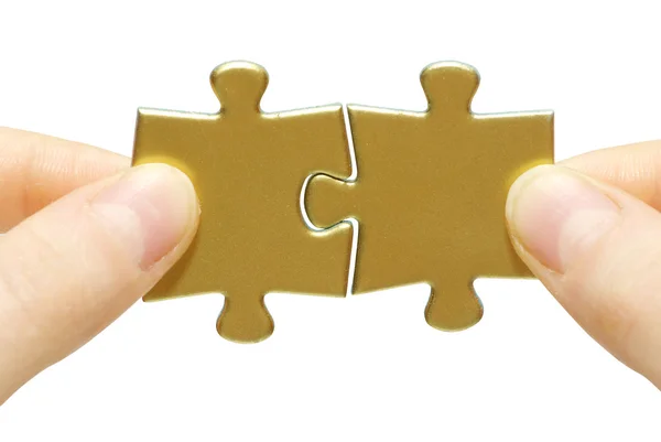 Puzzle in hand — Stock Photo, Image