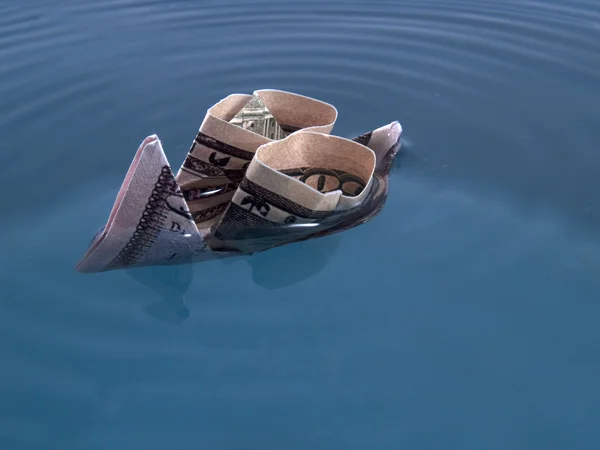 Dolar loď potápí — Stock fotografie