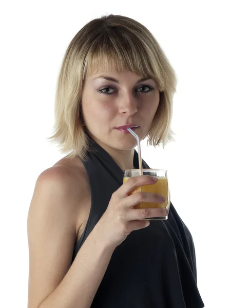 Blond dricka juice — Stockfoto