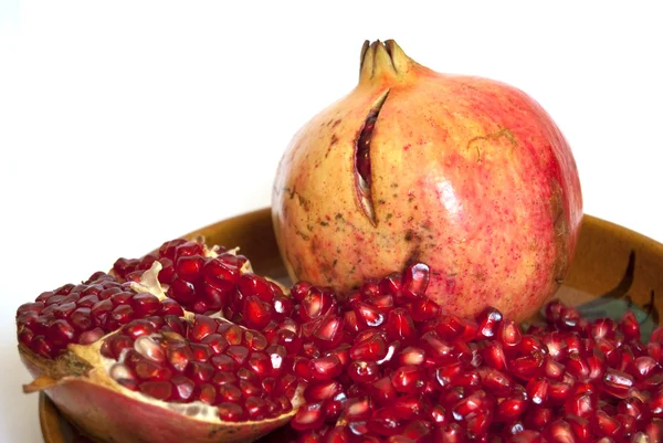 Pomegranate with seeds isolated — Stock Photo, Image